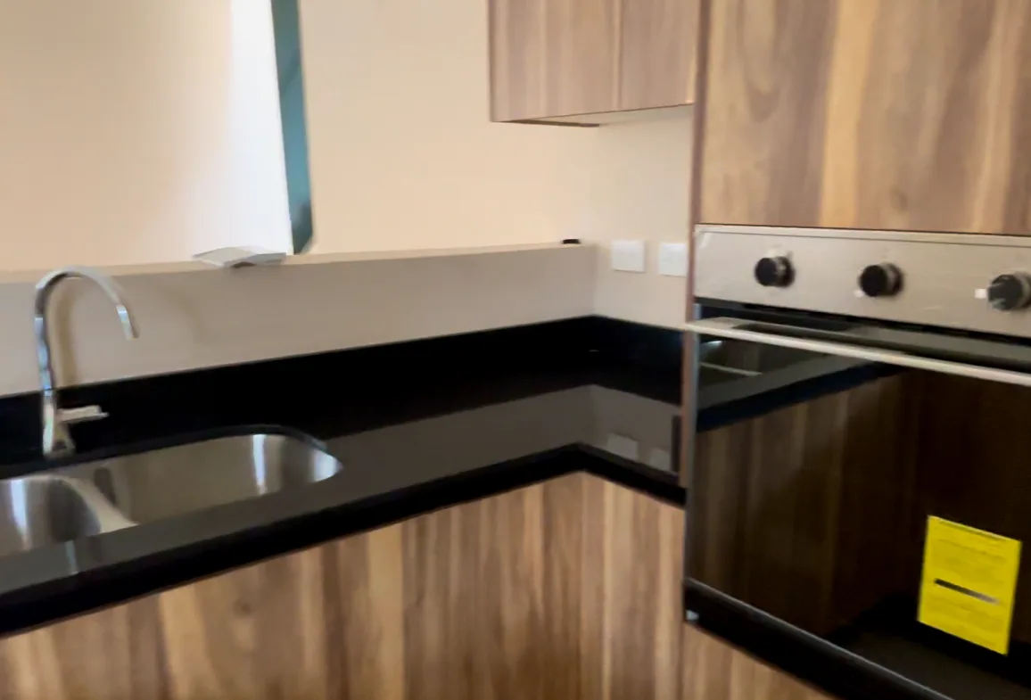 Kitchen with built-in oven – 3-bedroom house in Residencial Valenia, Playa del Carmen