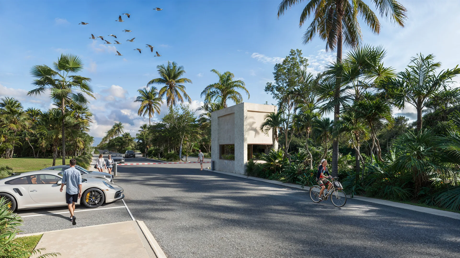 Acceso controlado con vialidad arbolada – lote en SelvaReal, Playa del Carmen