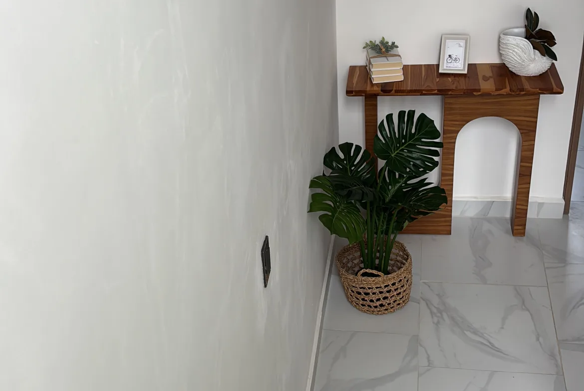 Pasillo con consola – casa de 2 recámaras en Playa del Carmen
