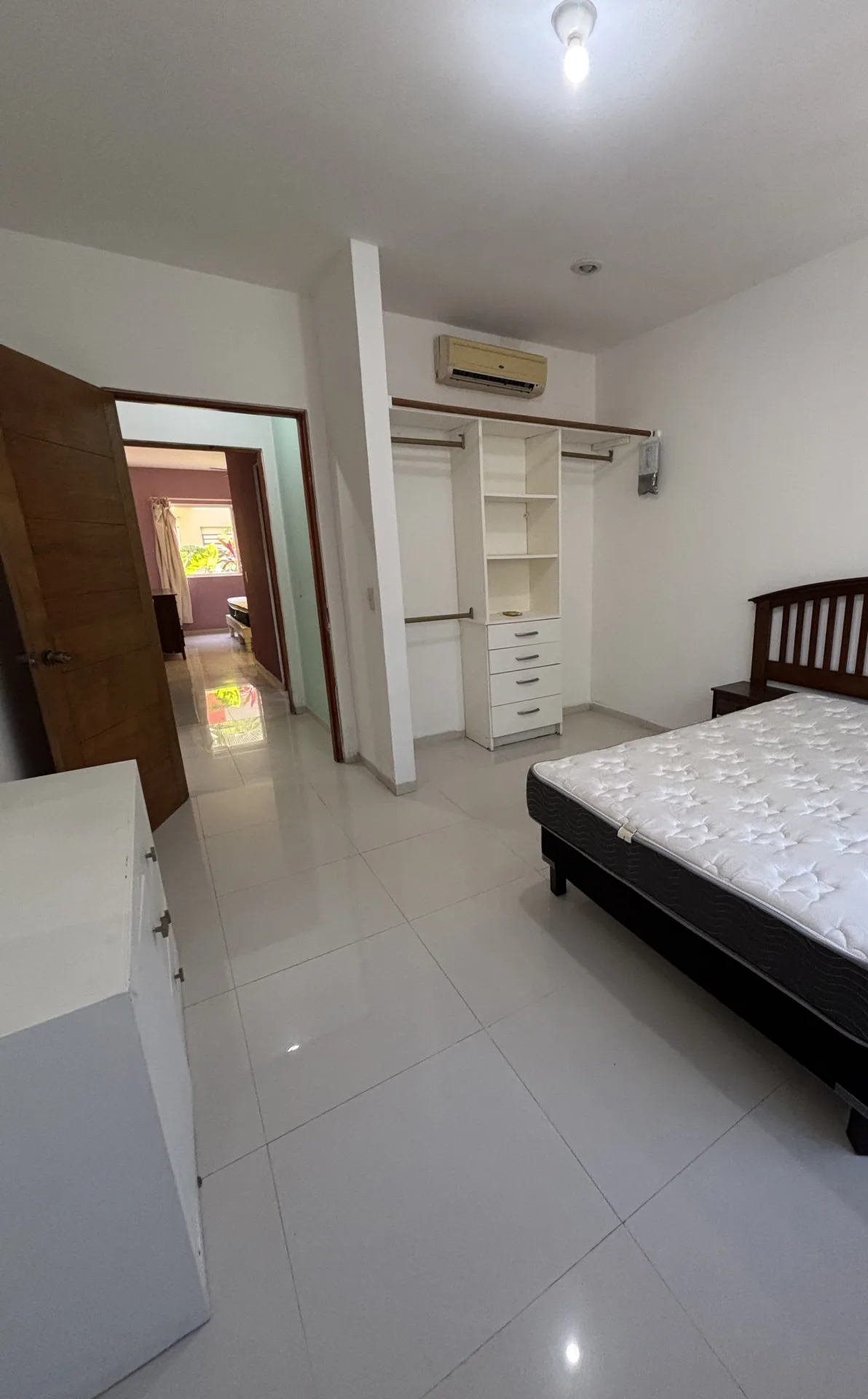 Bedroom with built-in closet and air conditioning – 2-bedroom condo in Playacar Phase 2