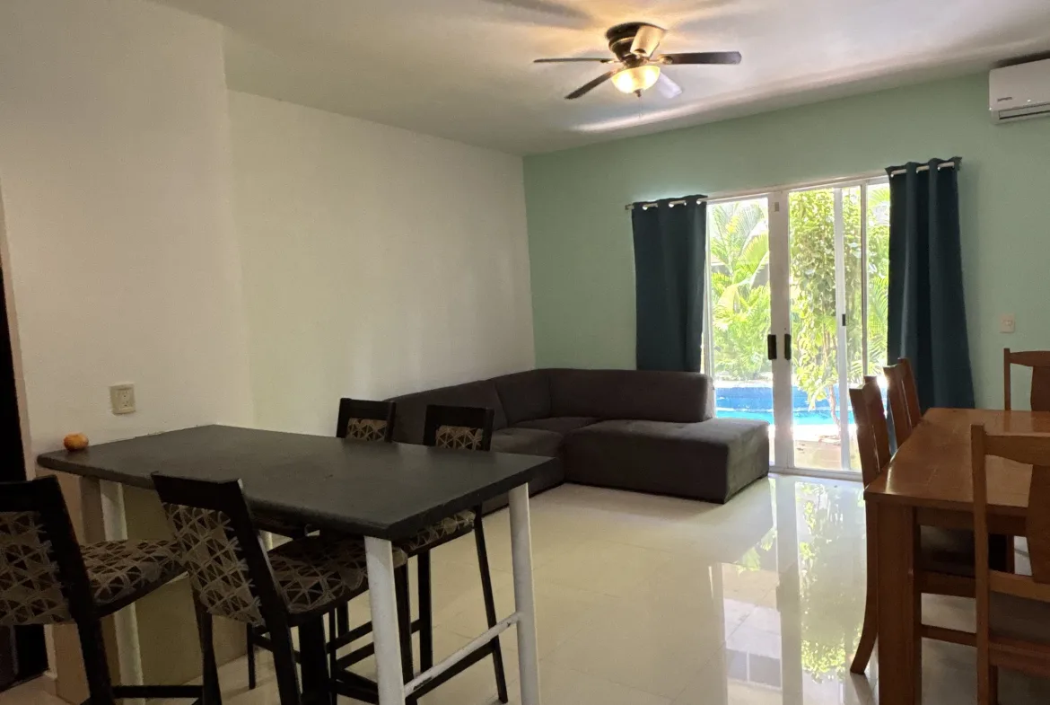 Open-plan living and dining area – 2-bedroom condo in Playacar Phase 2
