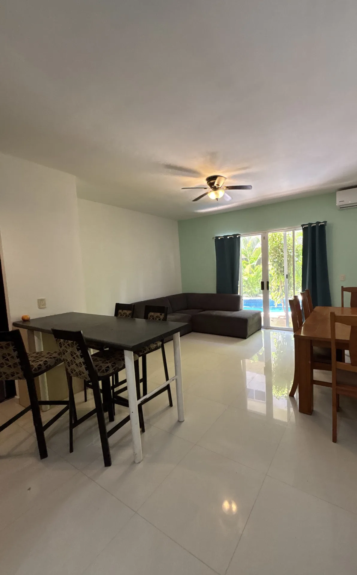 Open-plan living and dining area – 2-bedroom condo in Playacar Phase 2