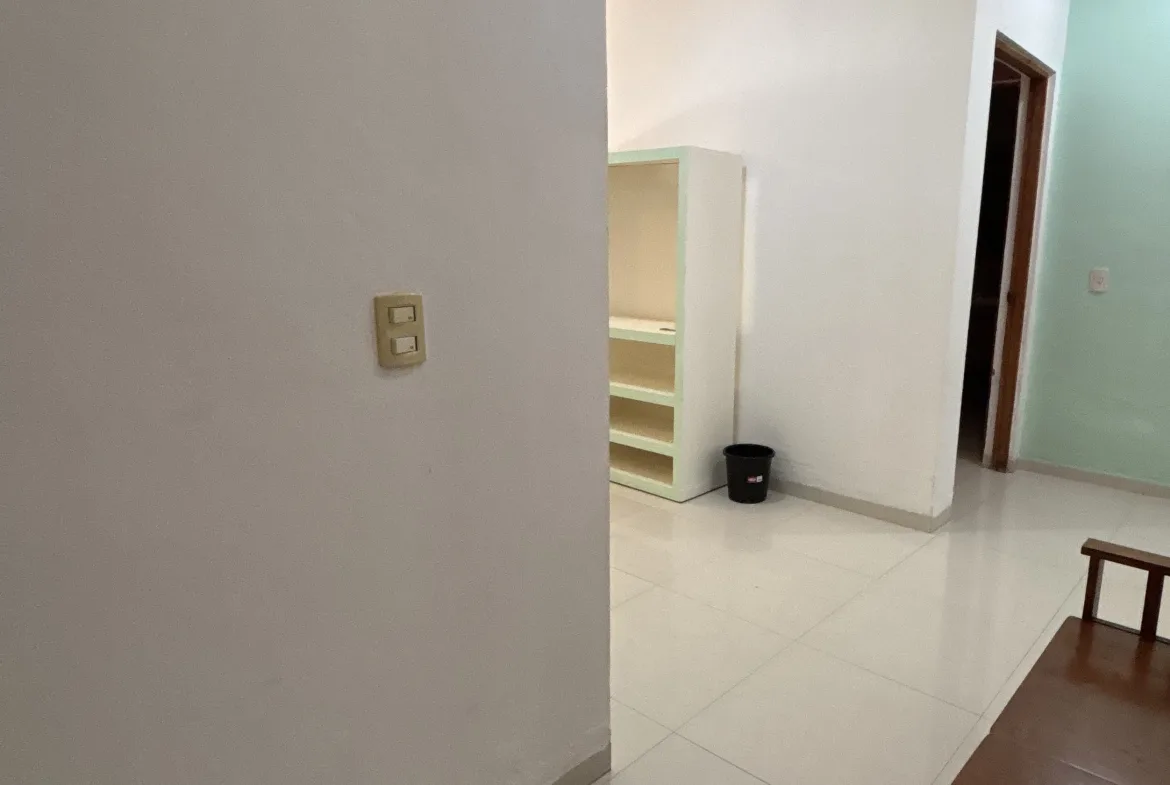 Hallway to the bedrooms – 2-bedroom condo in Playacar Phase 2