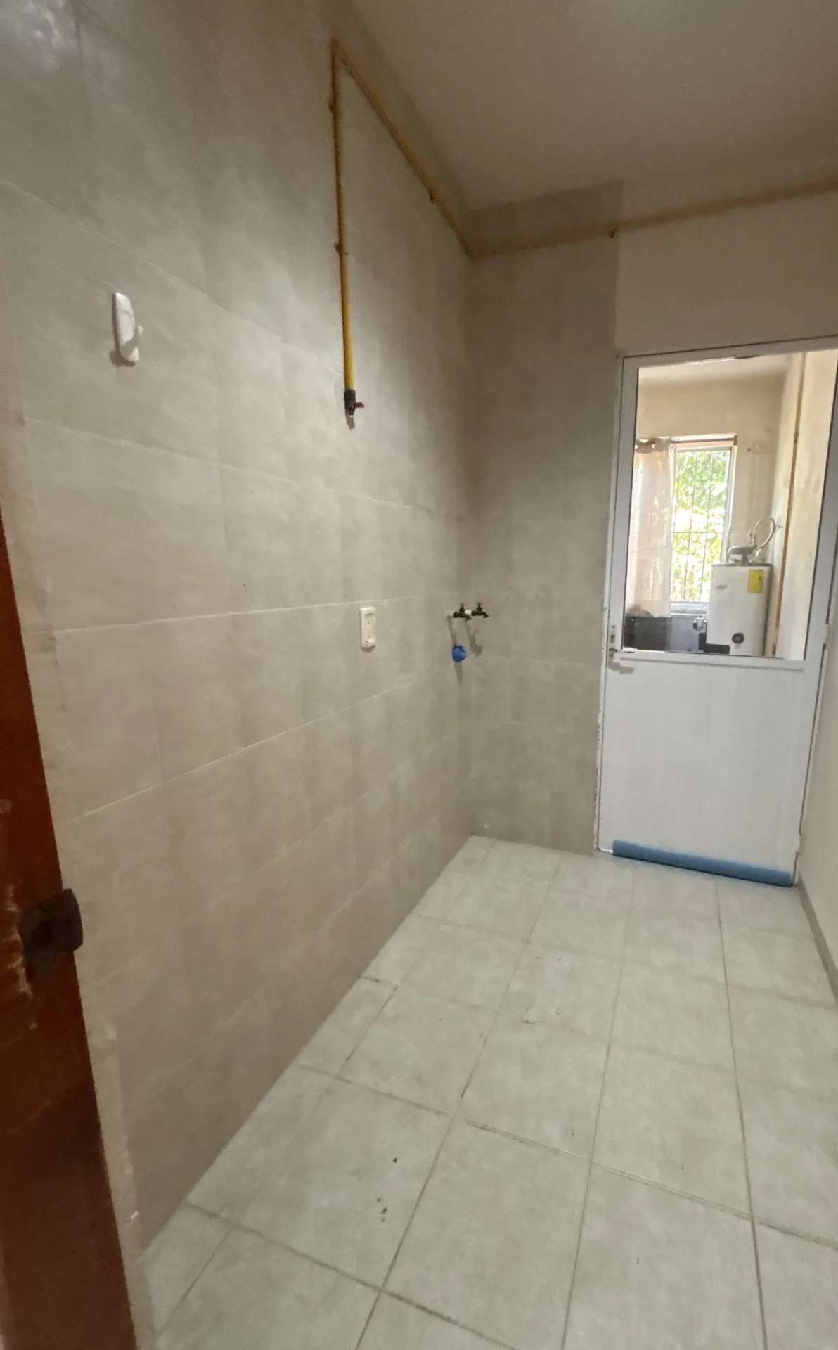 Laundry room – 2-bedroom condo in Playacar Phase 2