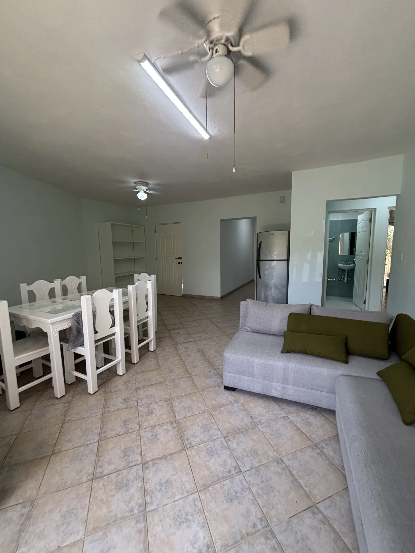 Living and dining room – 2-bedroom condo for rent in Playacar Phase 2