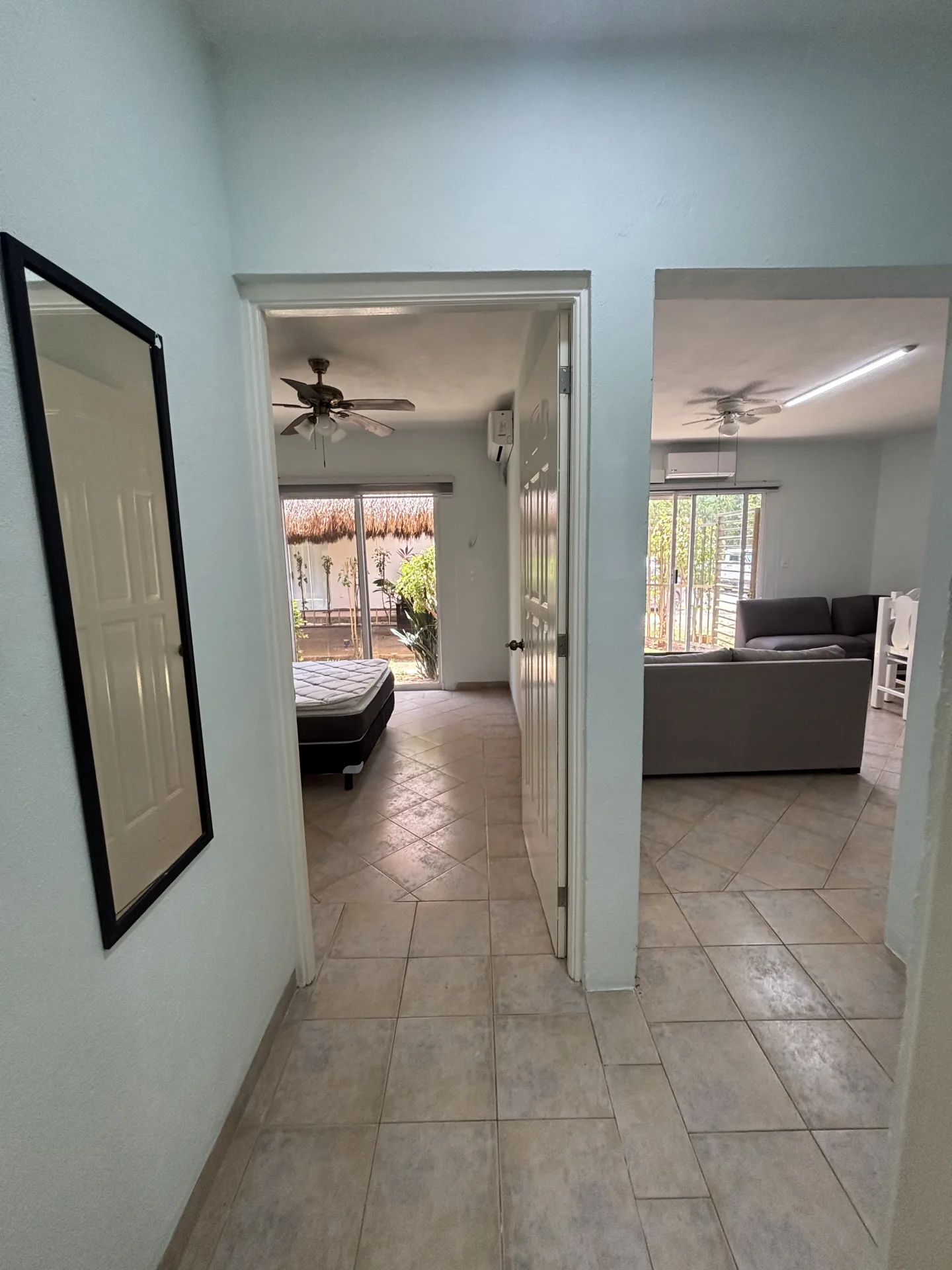 View from the bedroom to the living room – 2-bedroom condo for rent in Playacar Phase 2