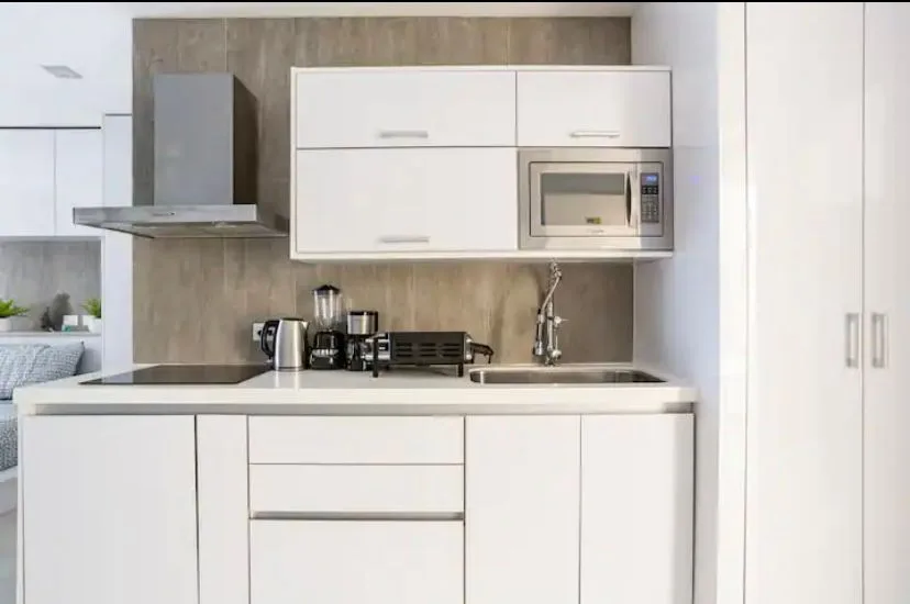 Kitchen with stainless steel appliances – 1-bedroom condo in Playa del Carmen