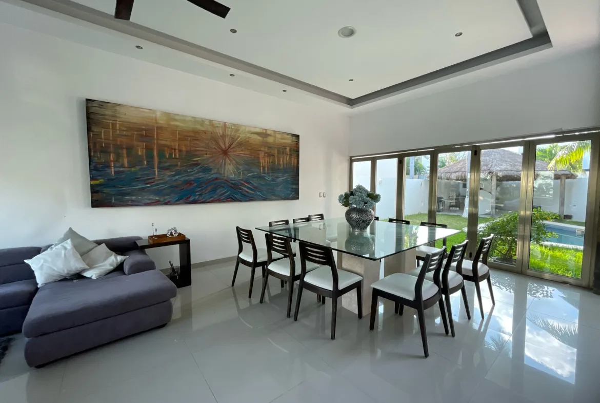 Living and dining room with garden views – 5-bedroom house in Villa Magna, Cancun
