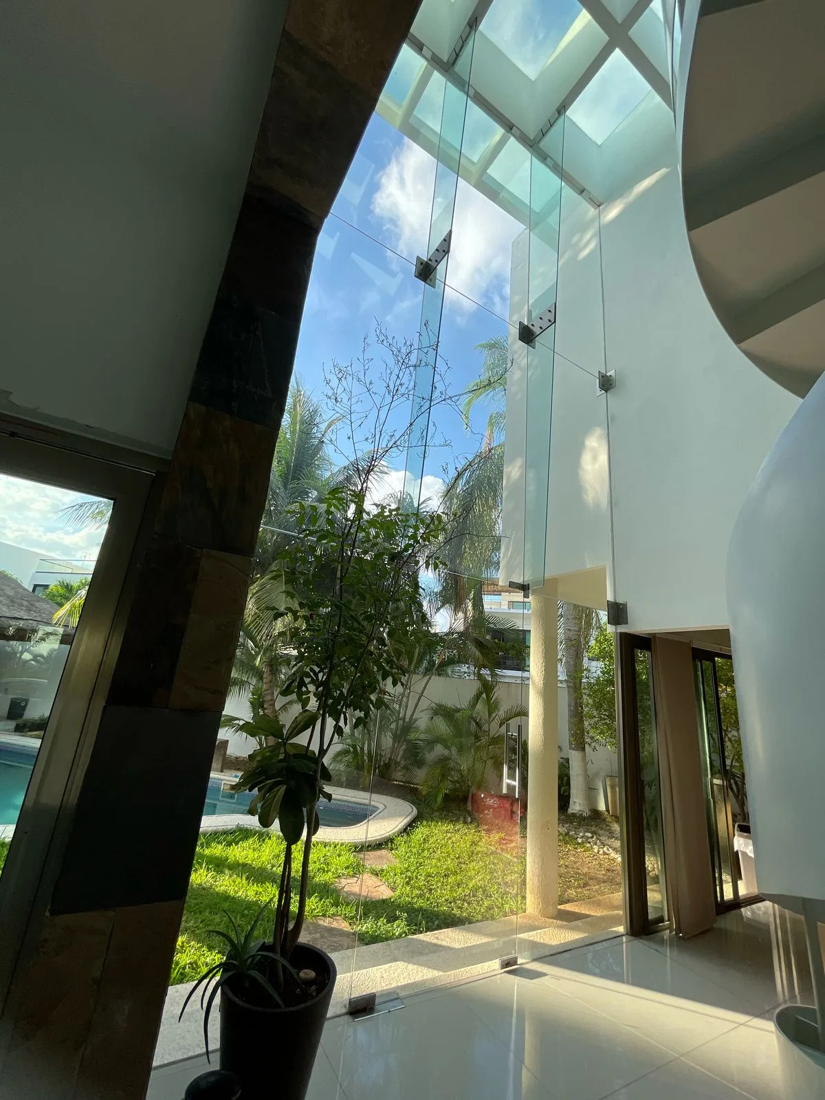 Glass staircase tower next to the garden – 5-bedroom house in Villa Magna, Cancun