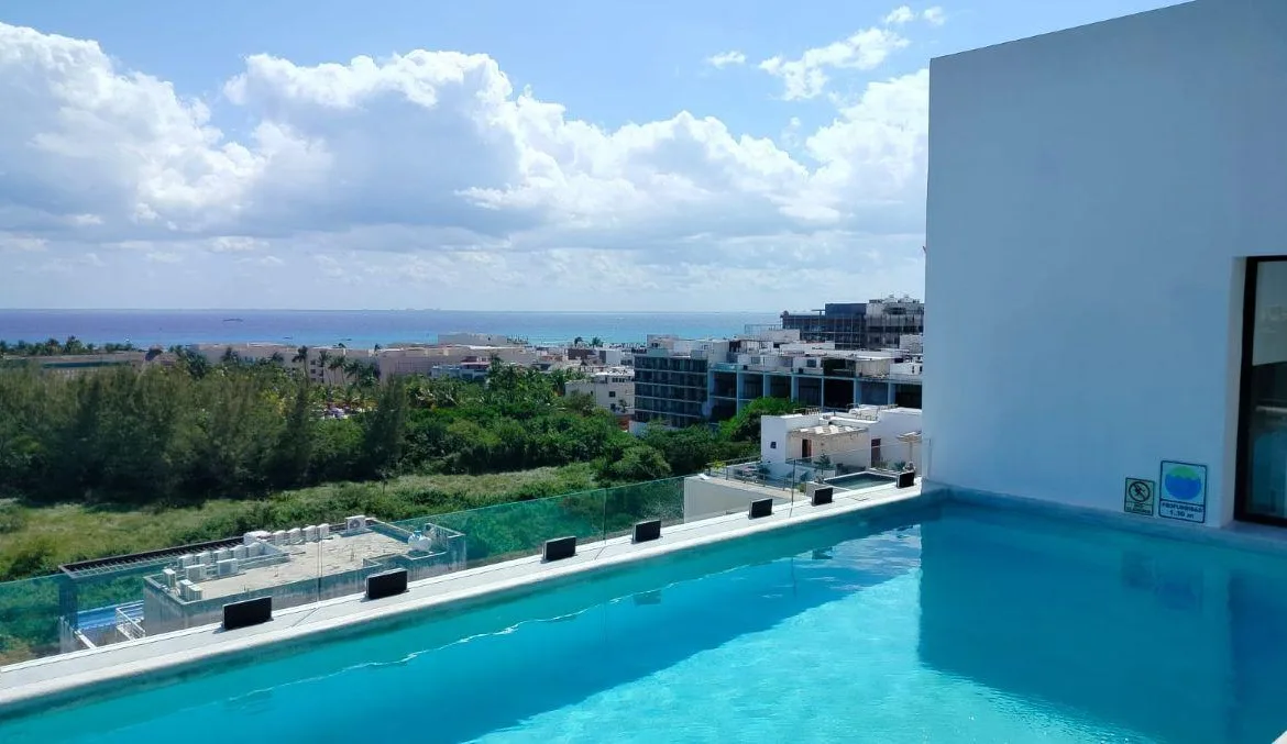 Departamento de 1 recámara con patio en venta en Playa del Carmen