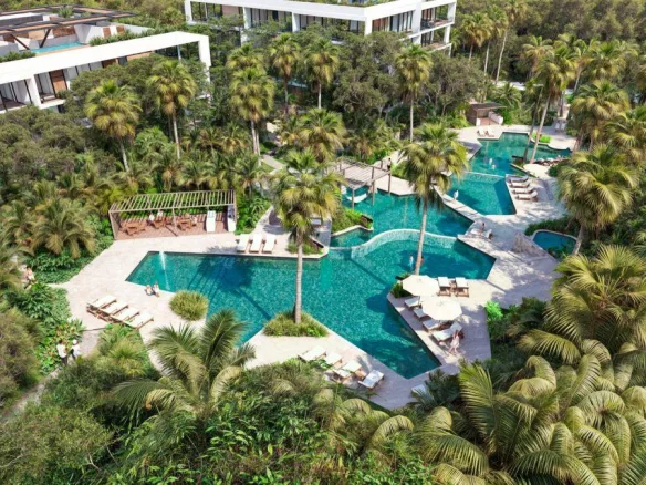 Departamento de 2 recámaras con estudio en venta en Playacar, Playa del Carmen