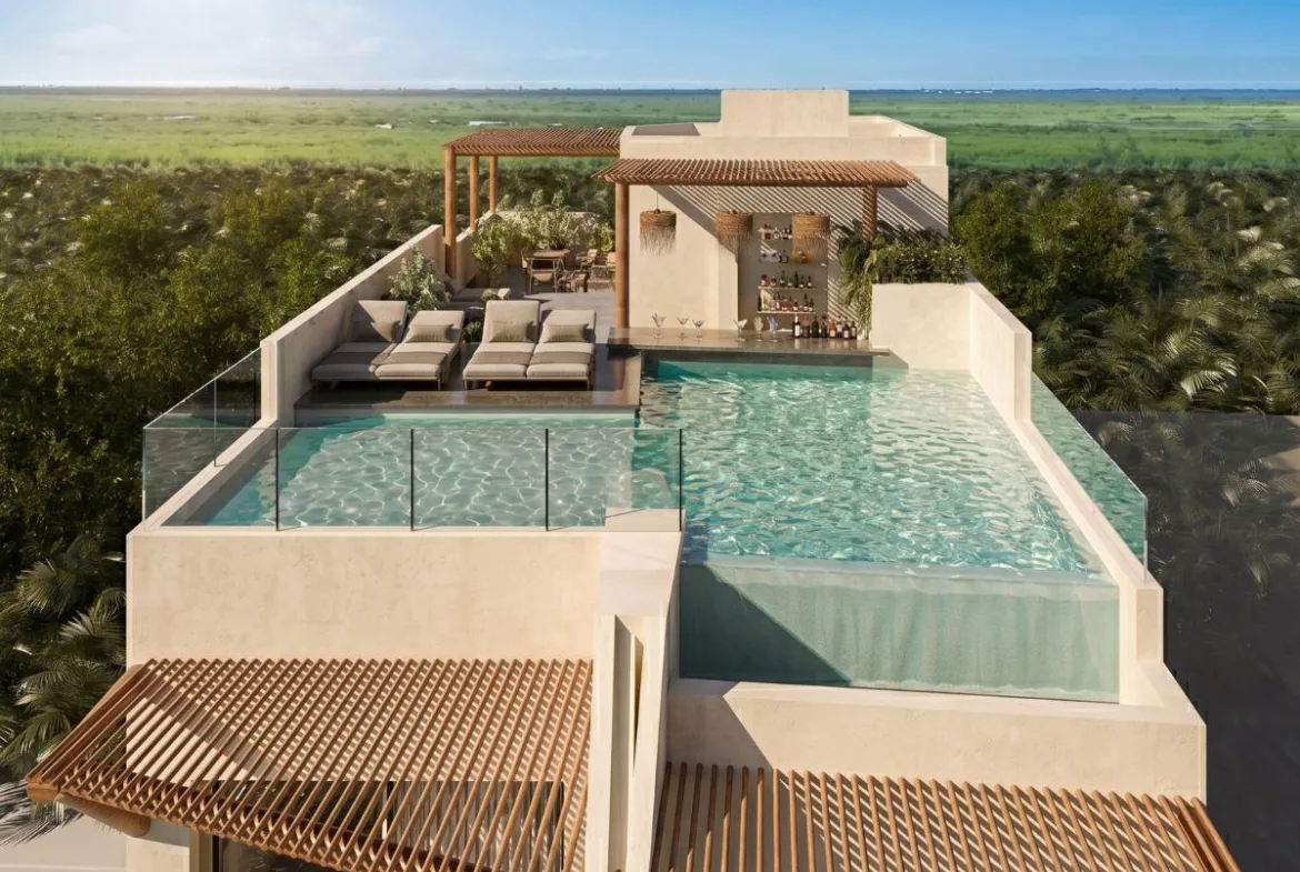 Departamento de 2 recámaras con vista al mar y alberca privada en venta en Puerto Morelos