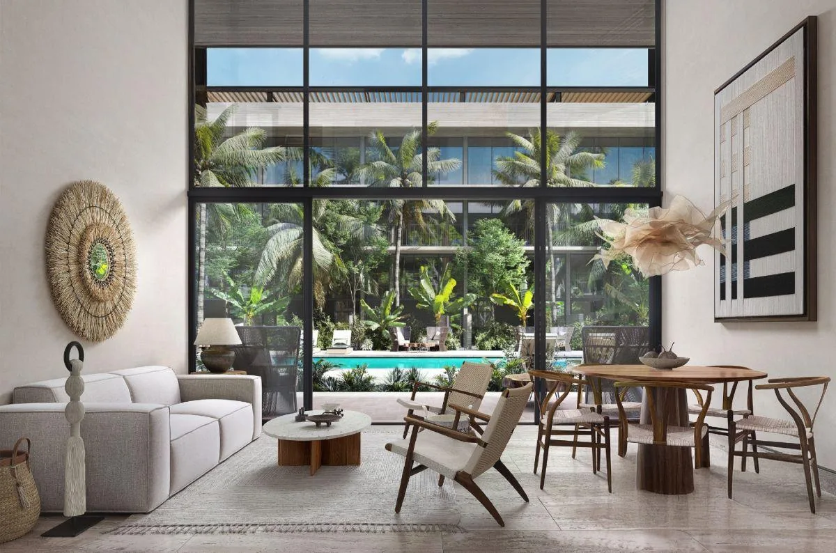 Departamento garden de 2 recámaras con doble altura en venta en Playa del Carmen