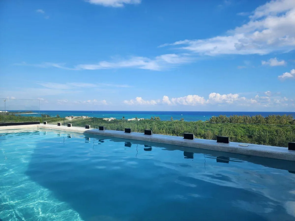 Studio with Balcony for Sale in Playa del Carmen | Steps from the Beach and Fifth Avenue | Rooftop